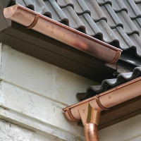 Do-it-yourself installation of metal gutters for the roof: technology analysis + installation example