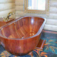 Bathroom in a wooden house: the rules of arrangement and features of decoration