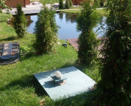 Septic tank near the pond