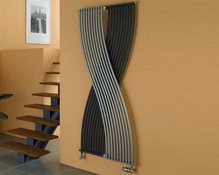 Ang tubular vertical radiator