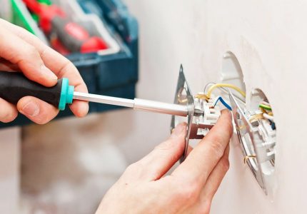 Connecting wires to a power outlet