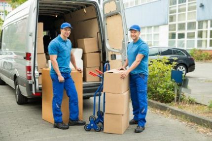 Service center employees transport equipment