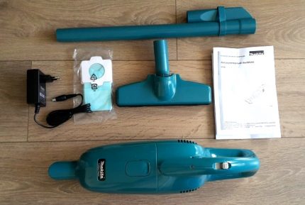 Disassembled vertical Makita dust