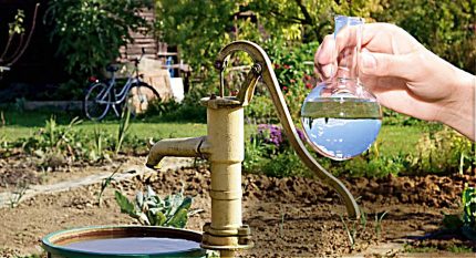 Water from a well in a flask