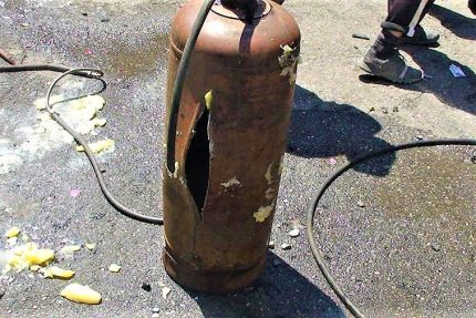 Exploded gas bottle