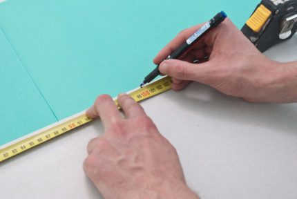 Layout on a sheet with a tape measure